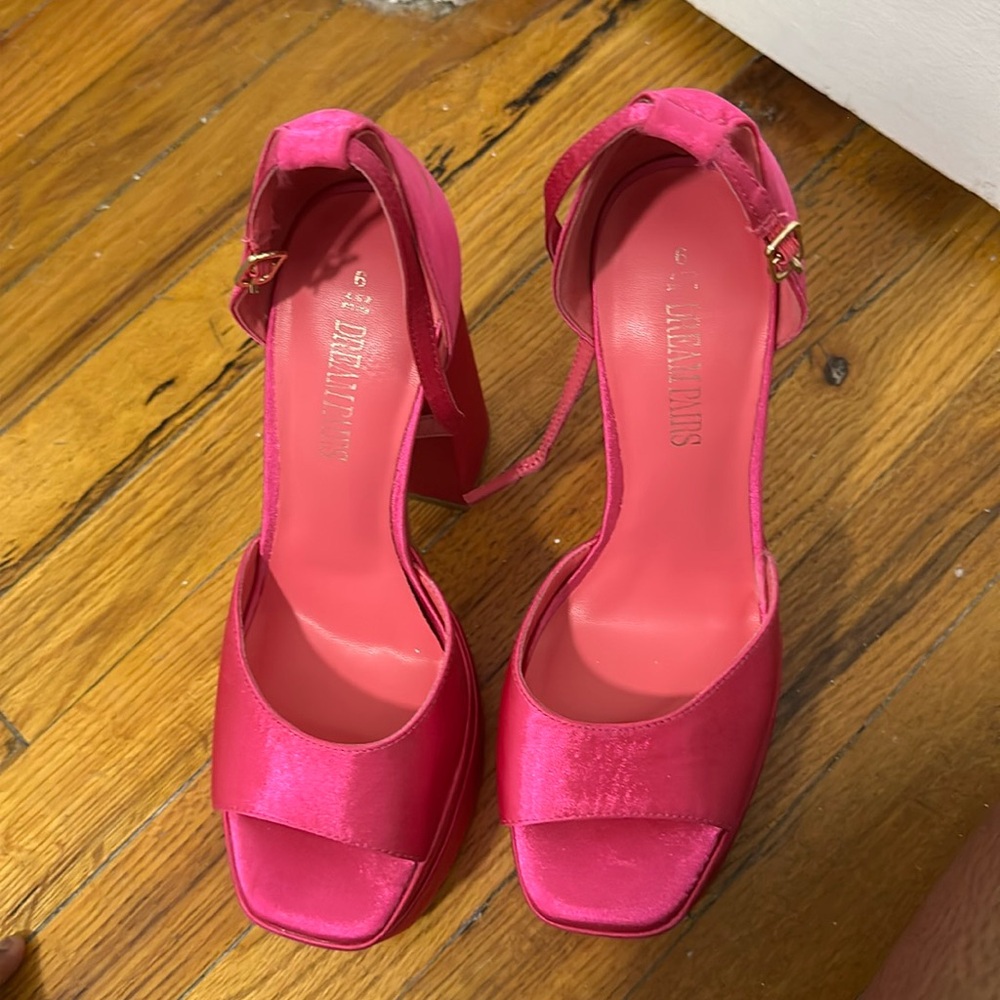 Pink chunk block heels.